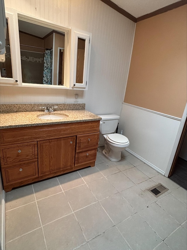 9670 Sayers Rd, Munith, MI 49259 - bathroom featuring vanity, ornamental molding, and tile patterned flooring