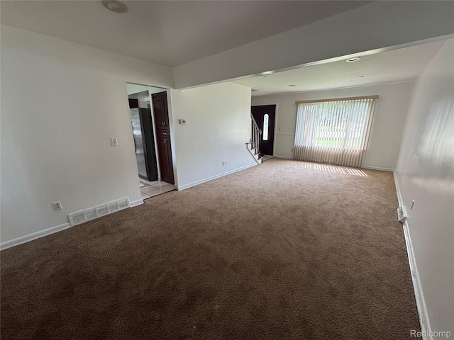 28240 Lahser Rd, Southfield, MI 48034 - empty room with stairs and light colored carpet