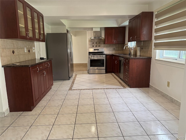 28240 Lahser Rd, Southfield, MI 48034 - kitchen featuring appliances with stainless steel finishes, wall chimney range hood, light tile patterned flooring, and decorative backsplash