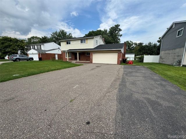 28240 Lahser Rd, Southfield, MI 48034 - traditional-style house with brick siding, an attached garage, driveway, and a porch