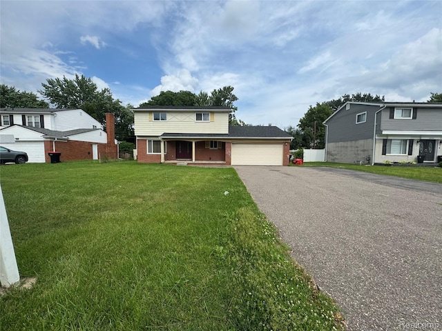 28240 Lahser Rd, Southfield, MI 48034 - traditional-style house featuring brick siding, a porch, driveway, an attached garage, and a front yard