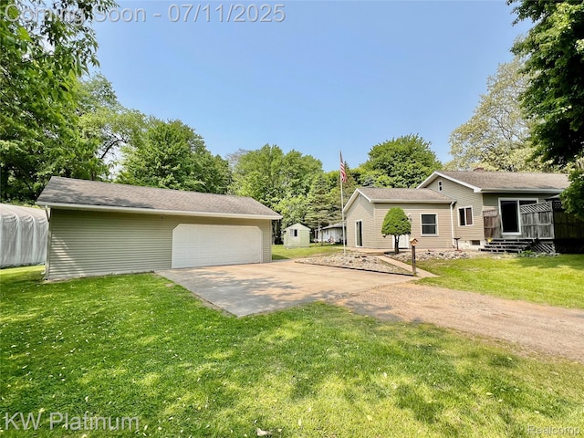 2243 Sunnyside Rd, Kimball, MI 48074 - view of property exterior featuring an outbuilding and a lawn