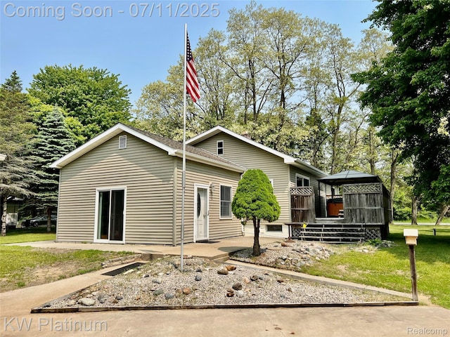 2243 Sunnyside Rd, Kimball, MI 48074 - view of front of house featuring a gazebo and a front lawn