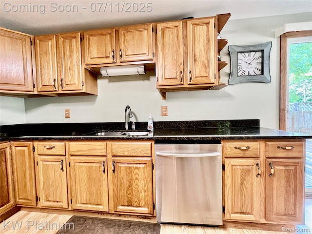 2243 Sunnyside Rd, Kimball, MI 48074 - kitchen with stainless steel dishwasher, dark stone counters, and light wood-type flooring