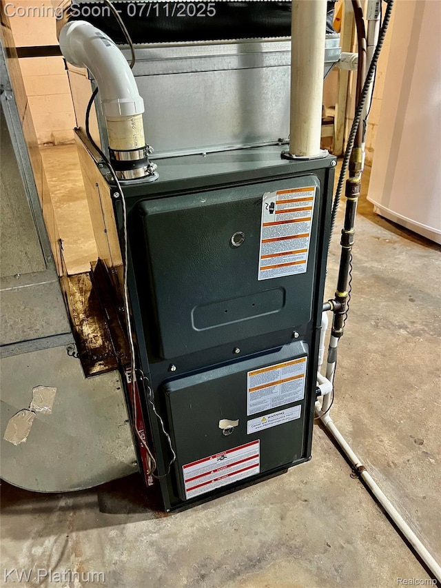 2243 Sunnyside Rd, Kimball, MI 48074 - utility room with heating unit
