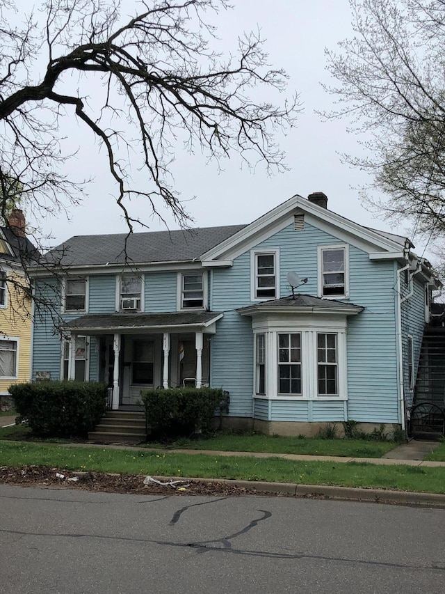 417 Oak St, Kalamazoo, MI 49007 - view of front of property featuring a porch and a chimney
