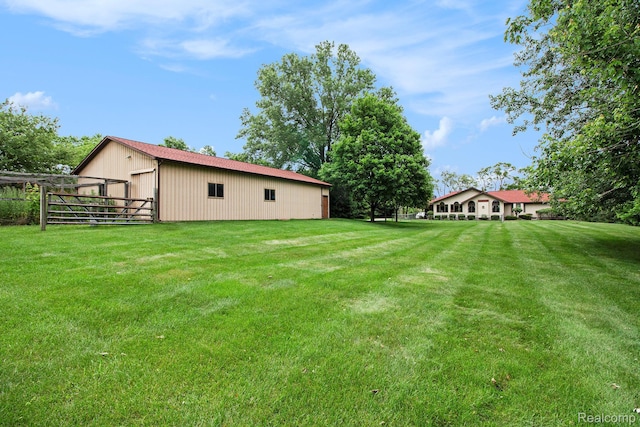 10363 E Bristol Rd, Davison, MI 48423 - view of yard featuring a pole building and an outbuilding