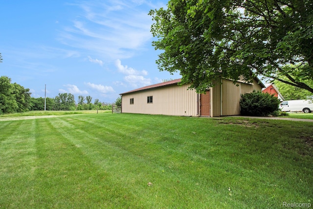 10363 E Bristol Rd, Davison, MI 48423 - view of green lawn with an outbuilding and an outdoor structure