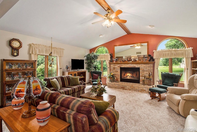 10363 E Bristol Rd, Davison, MI 48423 - carpeted living area with ceiling fan, healthy amount of natural light, and a fireplace