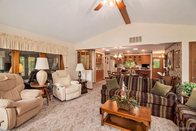 10363 E Bristol Rd, Davison, MI 48423 - living area with a ceiling fan, light carpet, and a chandelier