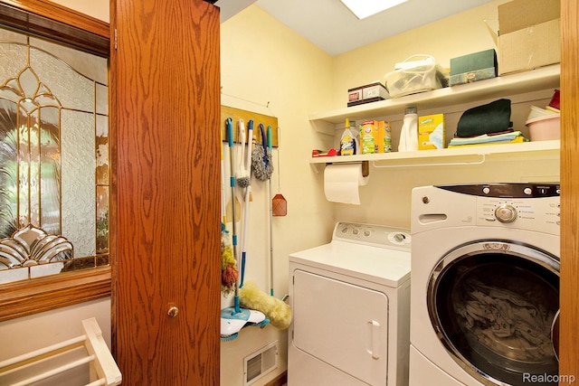 10363 E Bristol Rd, Davison, MI 48423 - laundry area with washing machine and dryer