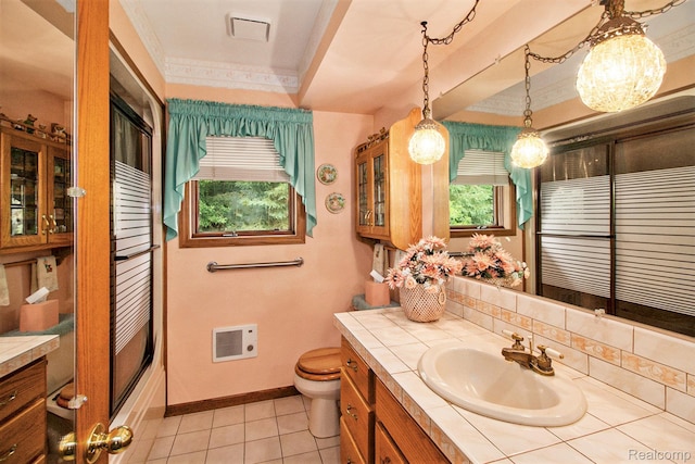 10363 E Bristol Rd, Davison, MI 48423 - bathroom featuring vanity, tile patterned flooring, a shower with shower door, and heating unit