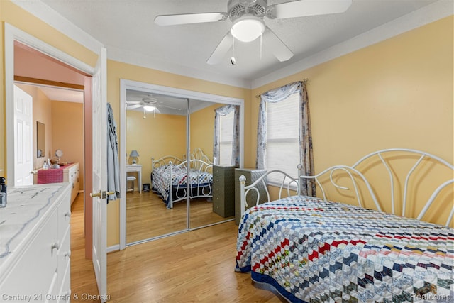 17729 Harman St, Melvindale, MI 48122 - bedroom with a closet, light wood-style floors, and a ceiling fan