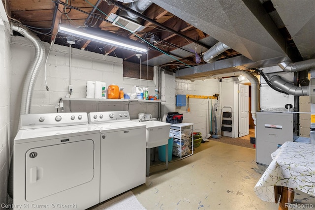 17729 Harman St, Melvindale, MI 48122 - unfinished basement featuring washer and dryer and heating unit