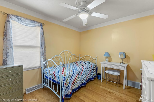 17729 Harman St, Melvindale, MI 48122 - bedroom with wood finished floors and a ceiling fan