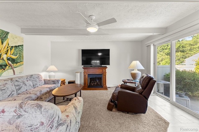 17729 Harman St, Melvindale, MI 48122 - living room with a textured ceiling, ceiling fan, a fireplace, and beam ceiling