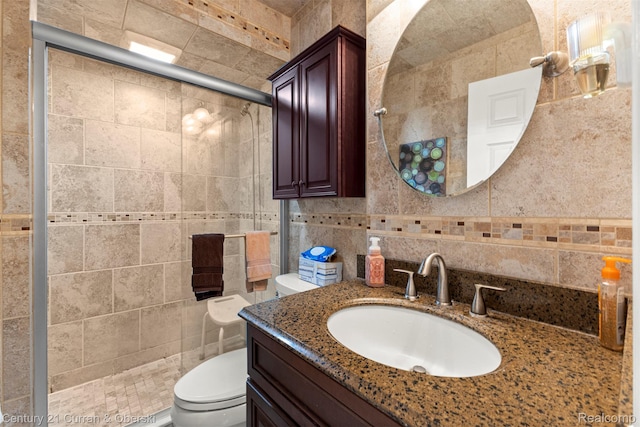 17729 Harman St, Melvindale, MI 48122 - bathroom featuring vanity, a stall shower, tile walls, and tasteful backsplash