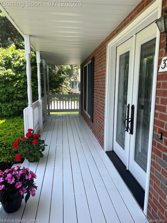 38443 Meghan Ln, Westland, MI 48185 - porch featuring french doors