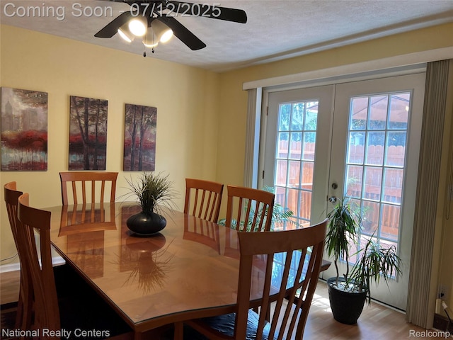 38443 Meghan Ln, Westland, MI 48185 - dining area with ceiling fan, wood finished floors, and a textured ceiling