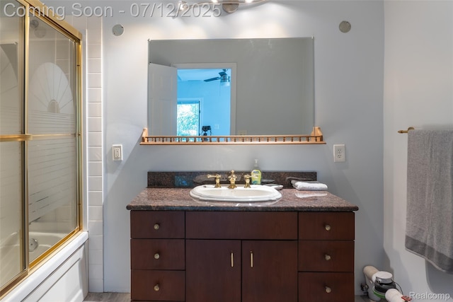 14778 Harrison St, Livonia, MI 48154 - bathroom featuring vanity and combined bath / shower with glass door