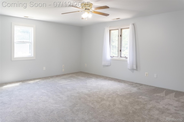 14778 Harrison St, Livonia, MI 48154 - empty room with carpet floors and ceiling fan