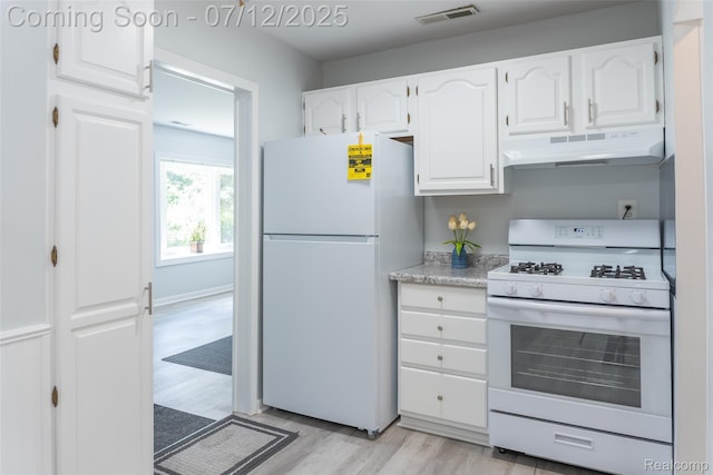 14778 Harrison St, Livonia, MI 48154 - kitchen with white appliances, under cabinet range hood, white cabinetry, and light wood finished floors