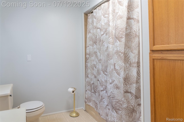 14778 Harrison St, Livonia, MI 48154 - full bathroom with a shower with shower curtain and tile patterned floors