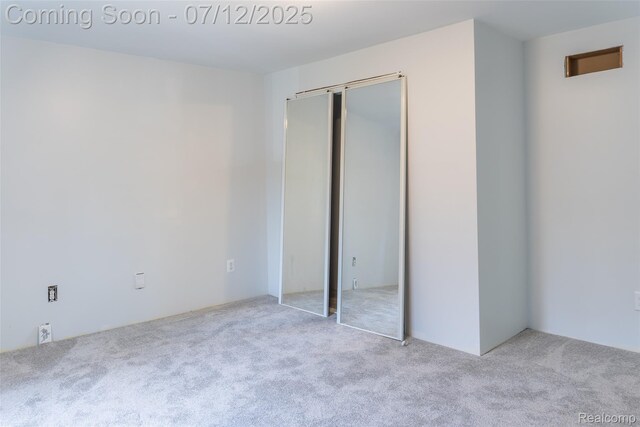14778 Harrison St, Livonia, MI 48154 - unfurnished bedroom with carpet floors and a closet