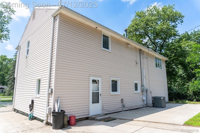 14778 Harrison St, Livonia, MI 48154 - rear view of house with a patio