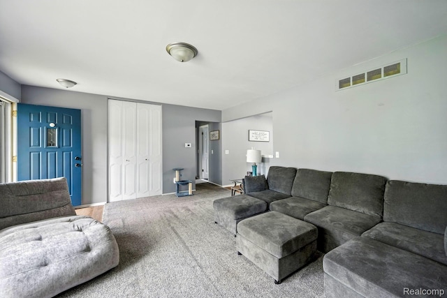 803 S Dayton St, Davison, MI 48423 - living room featuring carpet and baseboards