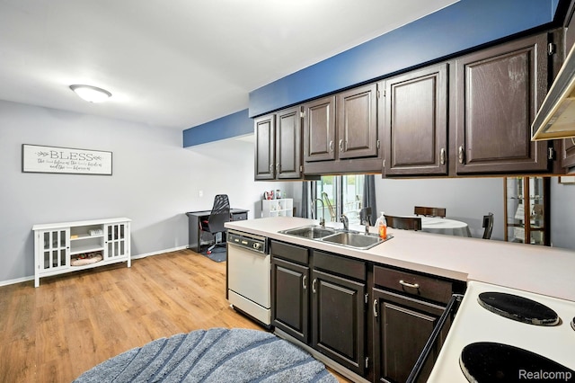803 S Dayton St, Davison, MI 48423 - kitchen featuring white appliances, light countertops, light wood finished floors, dark brown cabinets, and a desk