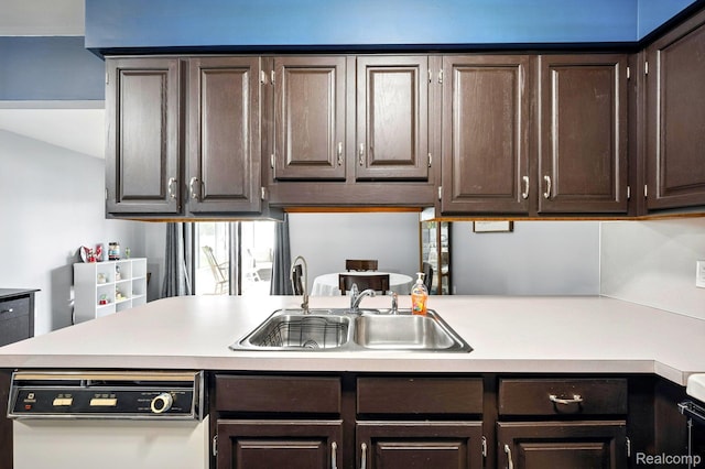 803 S Dayton St, Davison, MI 48423 - kitchen featuring light countertops and dark brown cabinetry