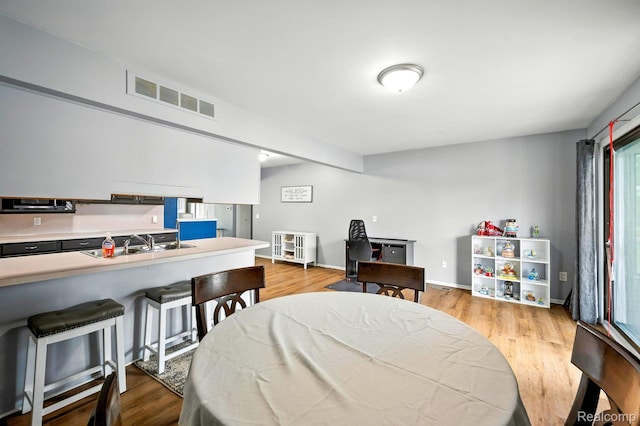 803 S Dayton St, Davison, MI 48423 - bedroom featuring wood finished floors