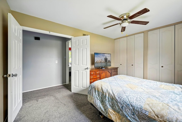 803 S Dayton St, Davison, MI 48423 - bedroom featuring carpet floors, two closets, and ceiling fan