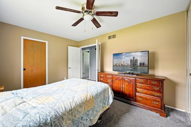 803 S Dayton St, Davison, MI 48423 - bedroom with dark carpet and a ceiling fan