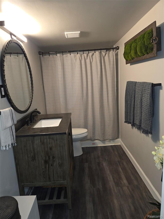 25050 Constitution Ave, Warren, MI 48089 - bathroom featuring vanity and wood finished floors
