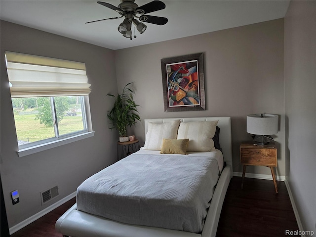 25050 Constitution Ave, Warren, MI 48089 - bedroom with wood finished floors and a ceiling fan
