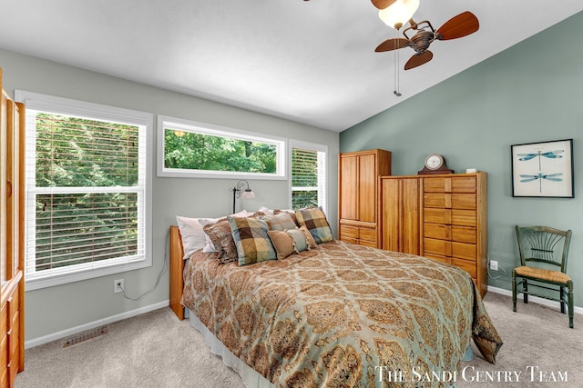 13400 Ravine View Dr, Grand Haven, MI 49417 - bedroom with light carpet, lofted ceiling, and ceiling fan