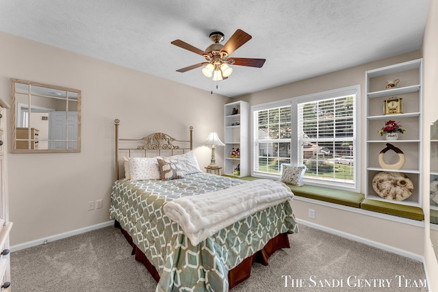 13400 Ravine View Dr, Grand Haven, MI 49417 - carpeted bedroom with a textured ceiling and a ceiling fan