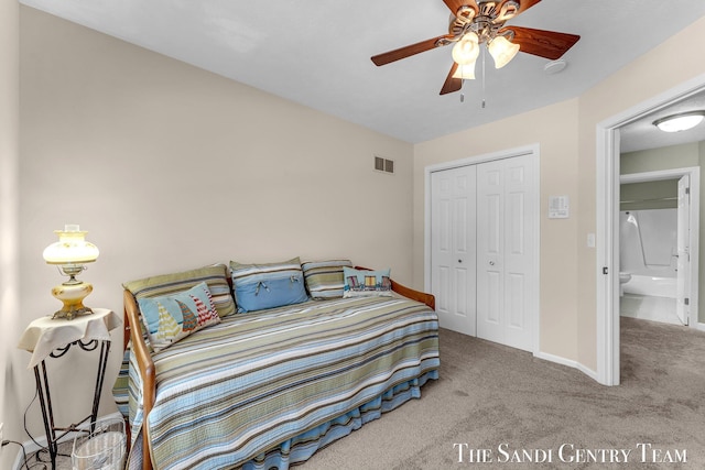 13400 Ravine View Dr, Grand Haven, MI 49417 - bedroom featuring a closet, carpet floors, and a ceiling fan