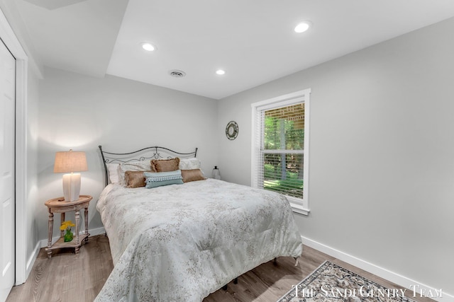 13400 Ravine View Dr, Grand Haven, MI 49417 - bedroom featuring recessed lighting and wood finished floors