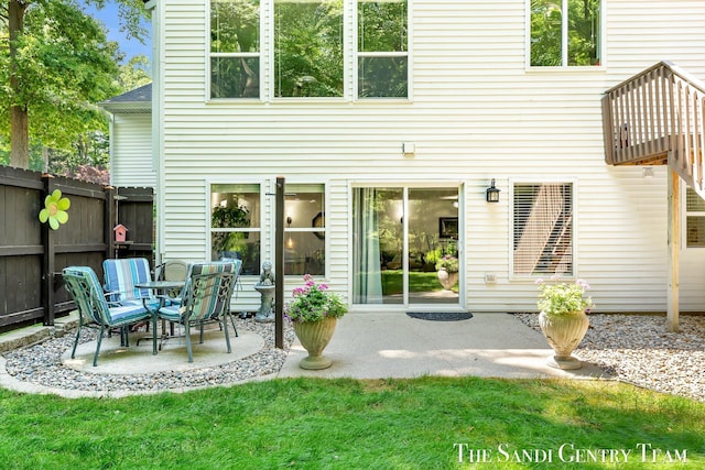 13400 Ravine View Dr, Grand Haven, MI 49417 - back of house with a patio