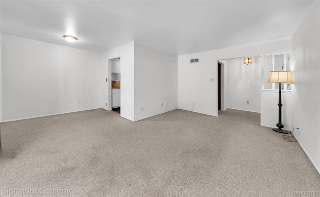 1870 Fort St Unit 1, Trenton, MI 48183 - spare room featuring carpet floors