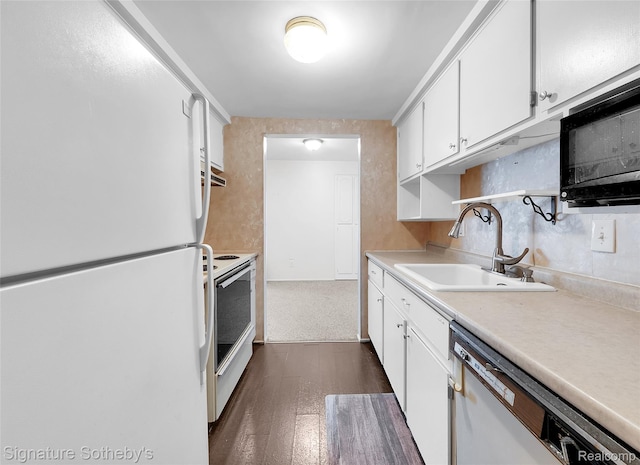 1870 Fort St Unit 1, Trenton, MI 48183 - kitchen featuring white appliances, dark wood finished floors, white cabinetry, and light countertops
