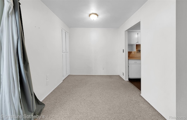 1870 Fort St Unit 1, Trenton, MI 48183 - unfurnished room featuring carpet flooring