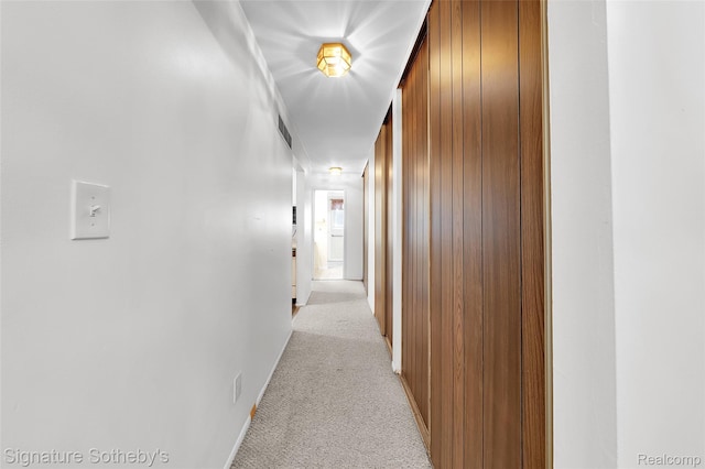 1870 Fort St Unit 1, Trenton, MI 48183 - hallway with light carpet and baseboards