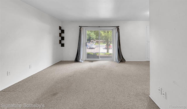 1870 Fort St Unit 1, Trenton, MI 48183 - unfurnished room featuring carpet flooring