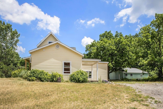 3345 Harmony Rd, Hopkins, MI 49328 - view of side of property featuring a lawn