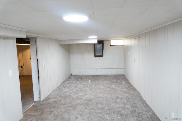 4410 Brunswick Ave, Flint, MI 48507 - basement featuring electric panel, carpet flooring, and wood walls