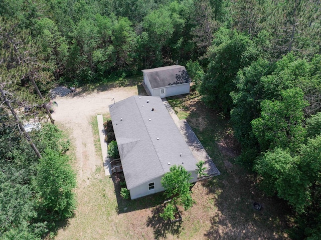 1134 Wagon Wheel Ln, Interlochen, MI 49643 - view of subject property with a heavily wooded area